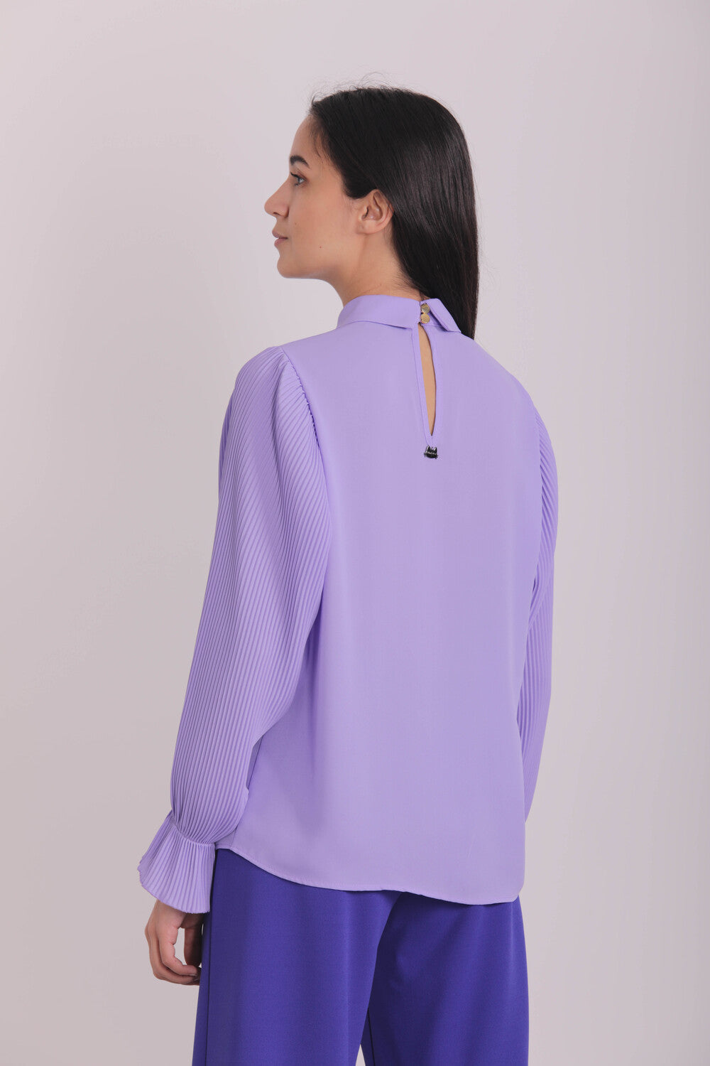 BLUSA CON MANICHE PLISSE