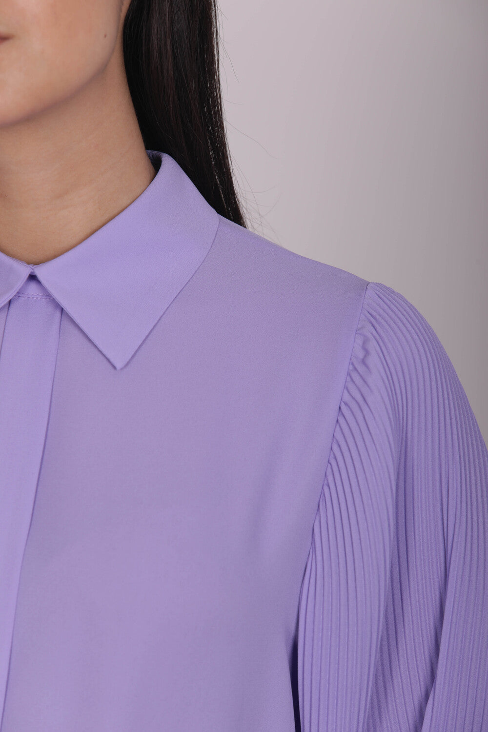 BLUSA CON MANICHE PLISSE