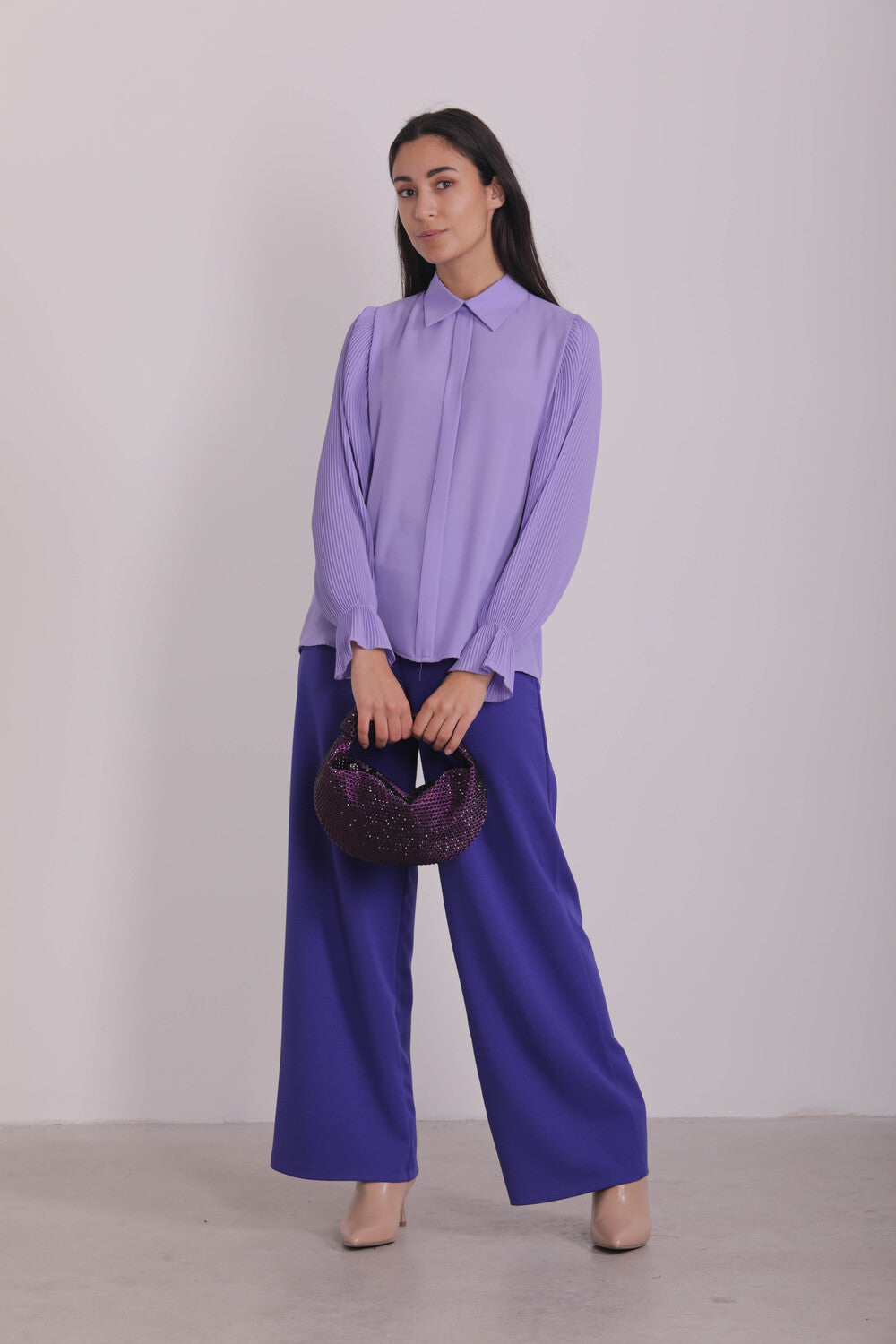 BLUSA CON MANICHE PLISSE