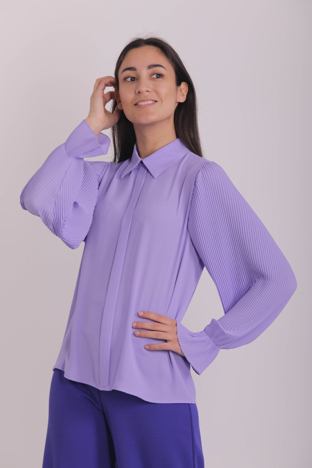 BLUSA CON MANICHE PLISSE