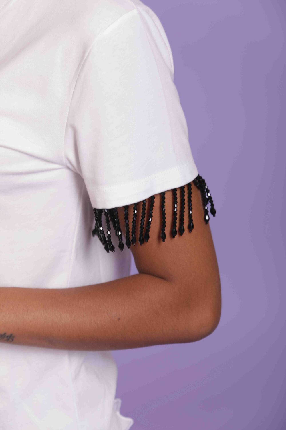 T-SHIRT CON DETTAGLIO FRANGE